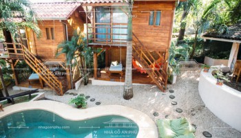 https://nhagoanphu.com/image/cache/catalog/mau-nha-go/Nha-go-hien-dai/NGHD-09/mau-nha-vuon-bang-go-ket-hop-be-boi-850x850.jpg